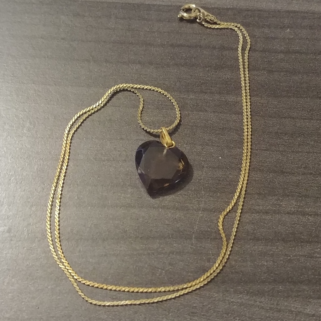 Black And Gold Colored Necklace